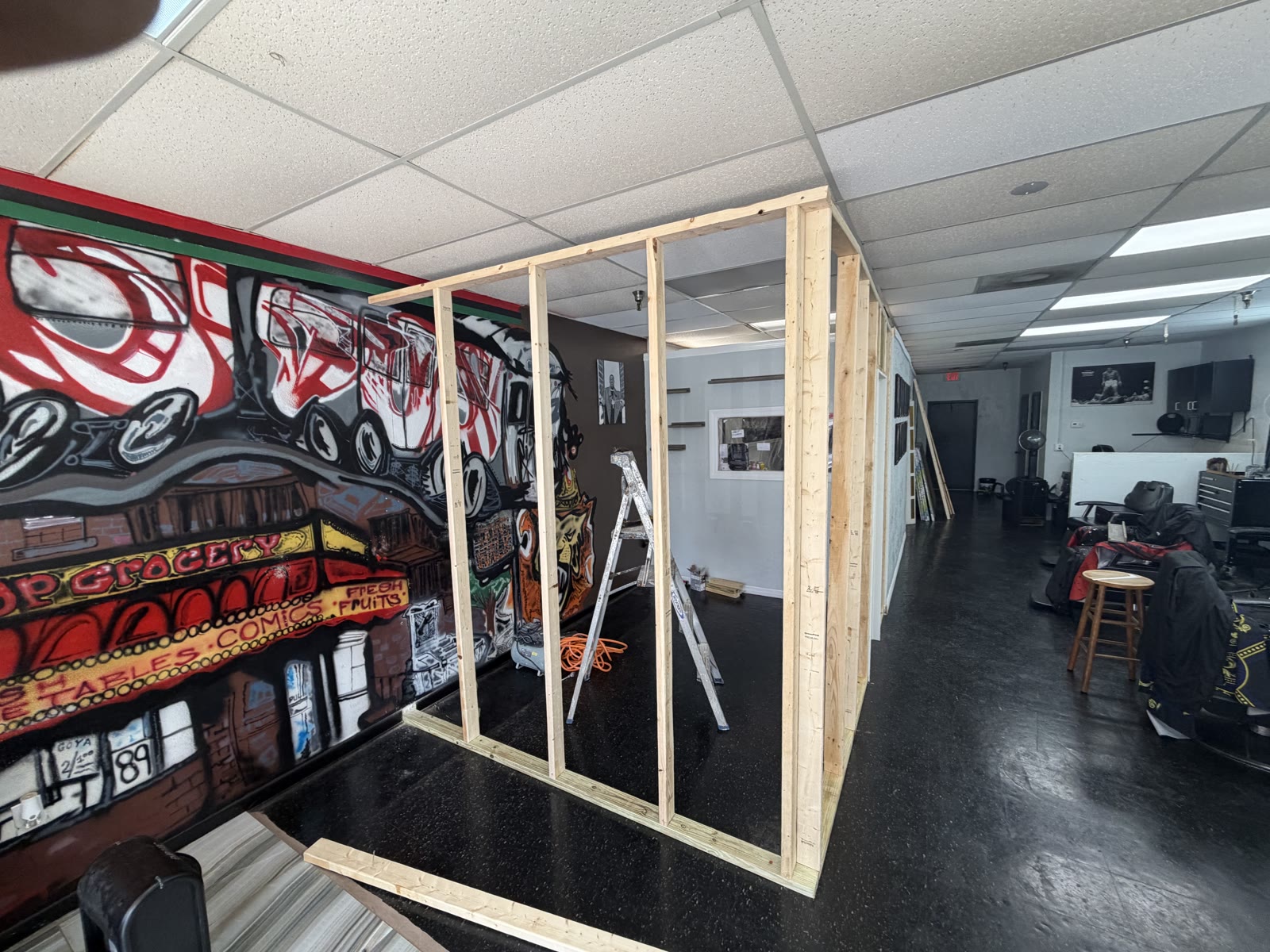 New stylist room wall framing at Exodus Barbershop in Palm Bay FL